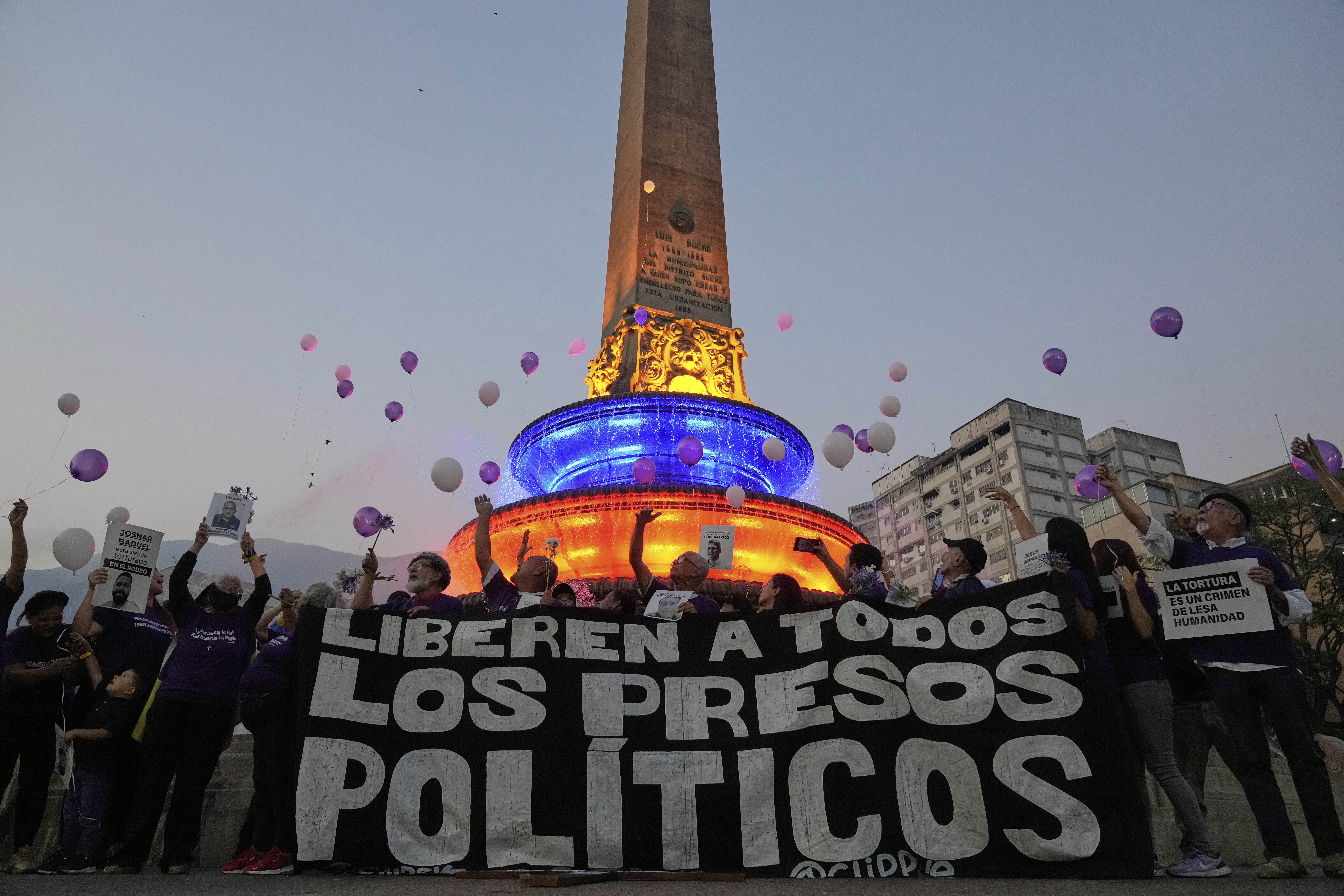 Activists and relatives of prisoners release balloons calling for the freedom of political prisoners, in Caracas, Venezuela, April 14.